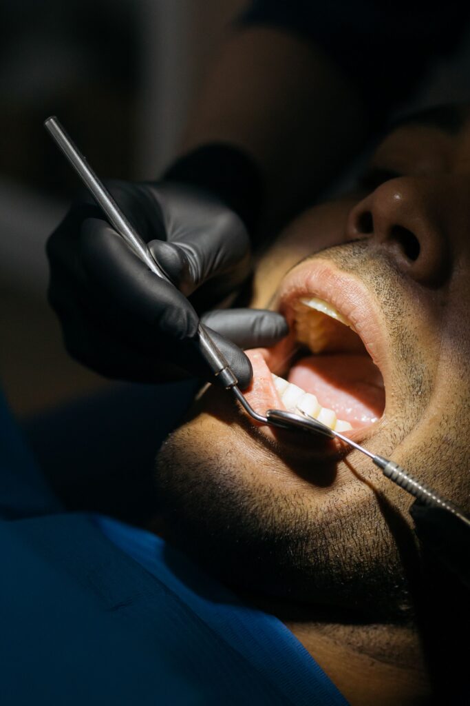 image of a man getting dental work done